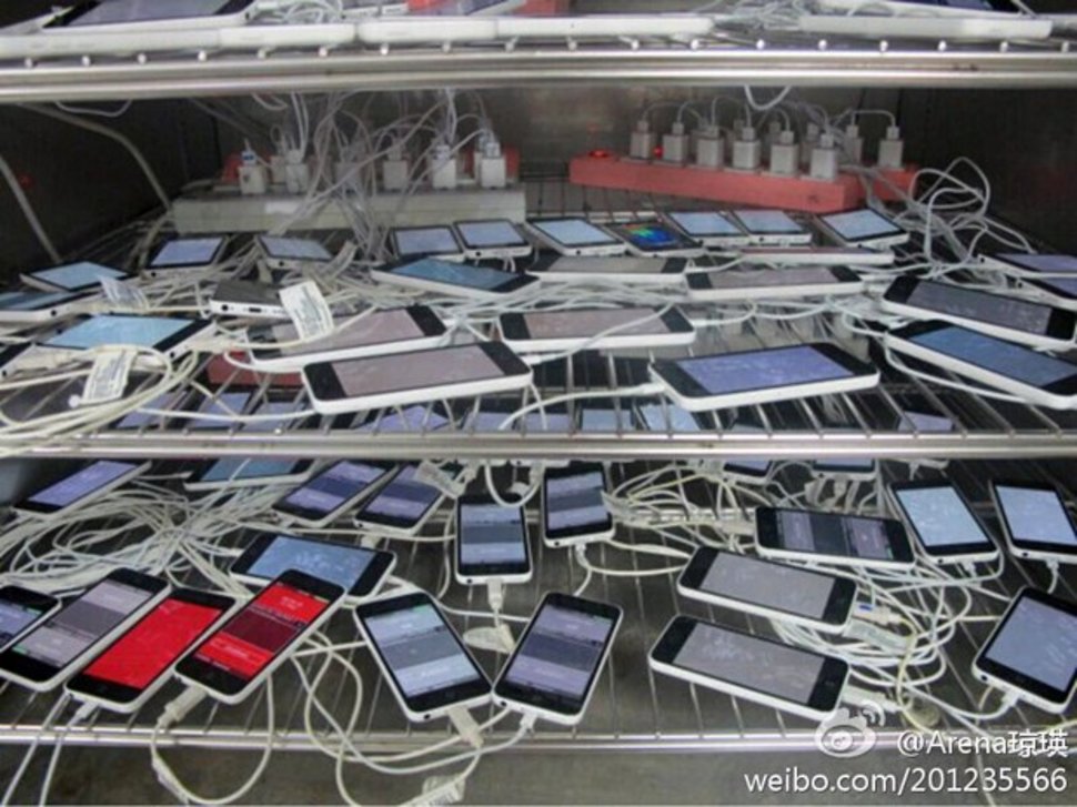 123116-phones-news-a-pile-of-iphone-5cs-caught-charging-at-pegatron-ahead-of-apple-s-september...jpg