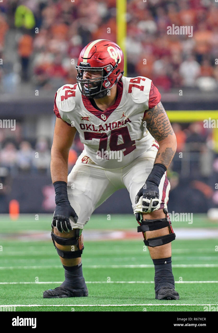 december-01-2018-oklahoma-sooners-offensive-lineman-cody-ford-74-in-the-ncaa-big-12-championship-football-game-between-the-university-of-texas-longhorns-and-the-university-of-oklahoma-sooners-at-att-stadium-in-arlington-tx-oklahoma-defeated-texas-39-27-albert-penacsm-R67XCR.jpg